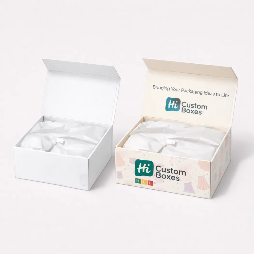 Two open corrugated shipping cartons- one plain white and one with branding and a skirt-patterned print- class=